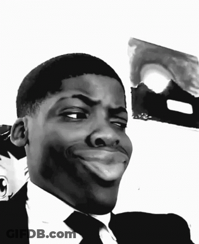 Black And White Man In Suit Making Funny Face GIF