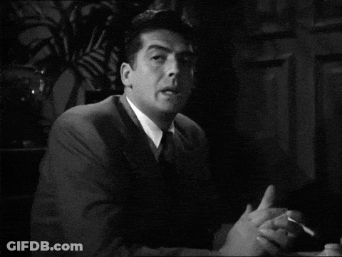 Black And White Man In Suit Smoking Cigarette GIF