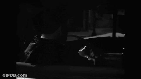 Black And White Man In Suit Smoking Cigarette GIF