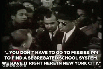 Black And White Man In Suit Talking To Crowd GIF
