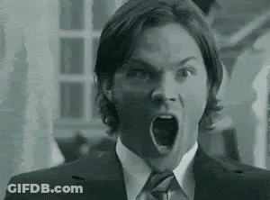 Black And White Man In Suit With Open Mouth GIF