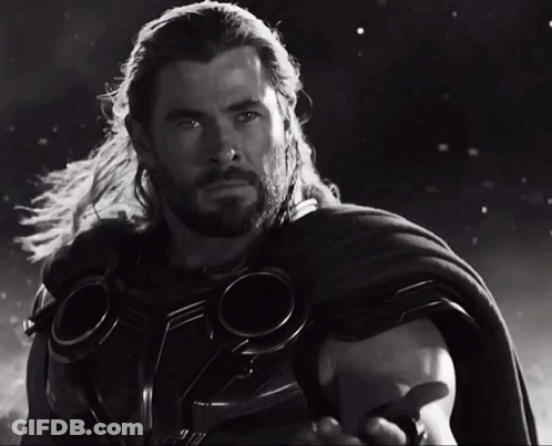 Black And White Man In Superhero Costume GIF
