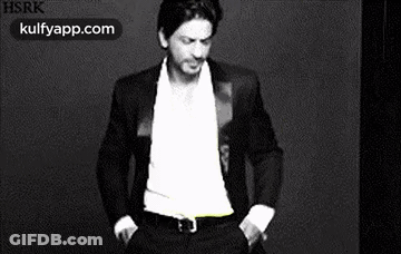 Black And White Man In Tuxedo Dancing GIF