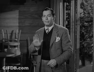Black And White Man In Vest And Jacket GIF