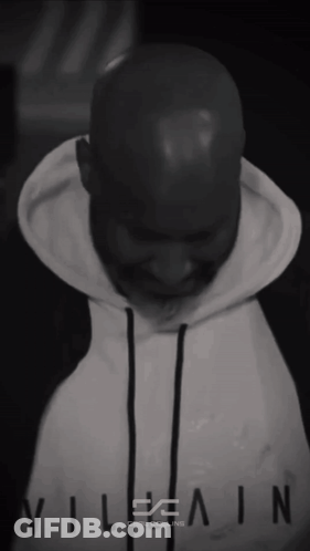 Black And White Man In White Hoodie Saying Villain GIF