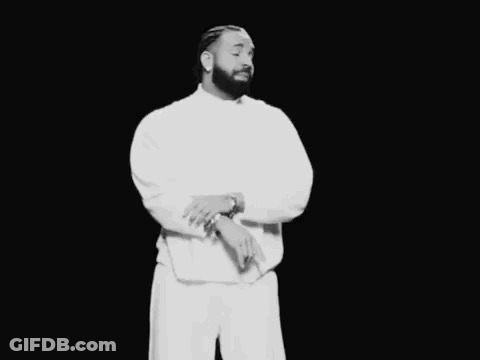 Black And White Man In White Shirt And Pants GIF
