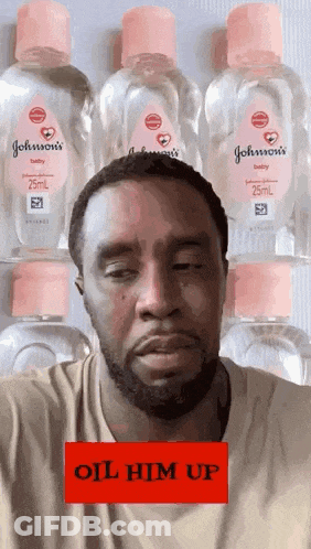 Black And White Man Kissing Woman On Cheek GIF