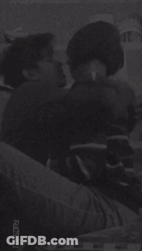 Black And White Man Lying On Bed GIF