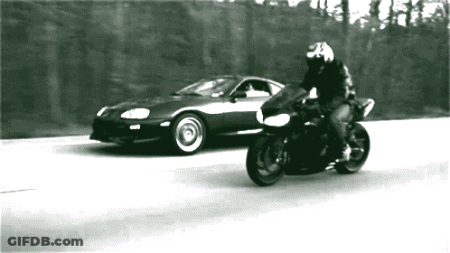 Black And White Man On Motorcycle And Car GIF