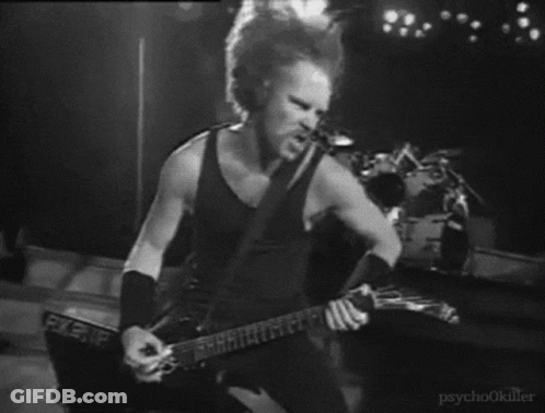 Black And White Man Playing Guitar On Stage GIF