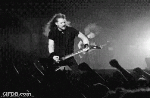 Black And White Man Playing Guitar On Stage GIF
