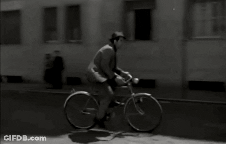 Black And White Man Riding Cycle GIF