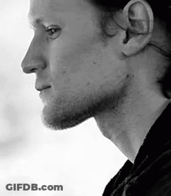 Black And White Man's Face With Beard And Ear GIF