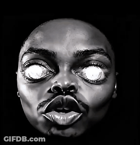 Black And White Man's Face With Glowing Eyes GIF