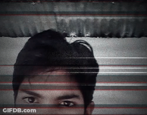 Black And White Man's Face With Striped Background GIF