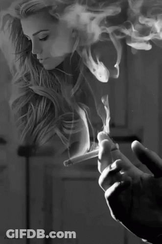 Black And White Man Smoking Cigarette Woman Behind GIF