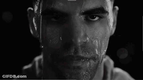 Black And White Man Spitting Water GIF
