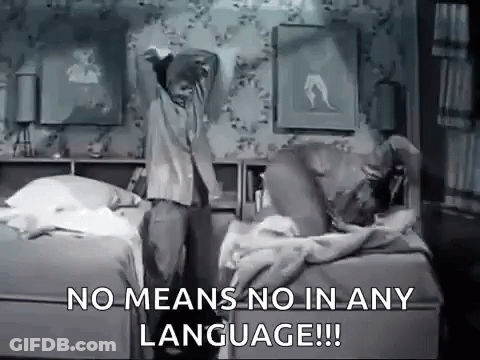 Black And White Man Standing In Front Of Bed Saying No Means No In Any Language GIF