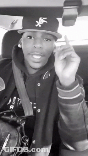 Black And White Man Wearing Hat Saying A GIF
