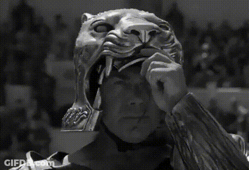 Black And White Man Wearing Lion Helmet GIF