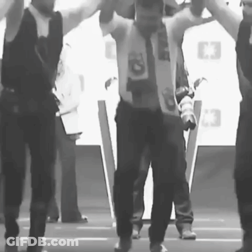 Black And White Man With C3 Logo On Chest GIF