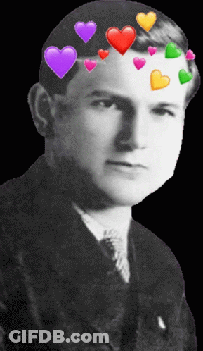 Black And White Man With Colorful Hearts On Head GIF