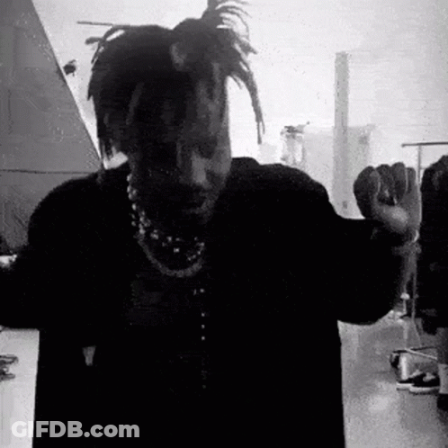 Black And White Man With Dreadlocks And Necklace GIF