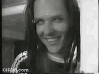Black And White Man With Dreadlocks Smiling GIF