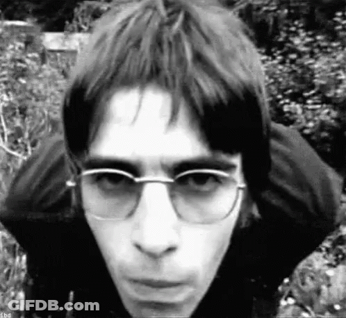 Black And White Man With Glasses And Black Jacket GIF