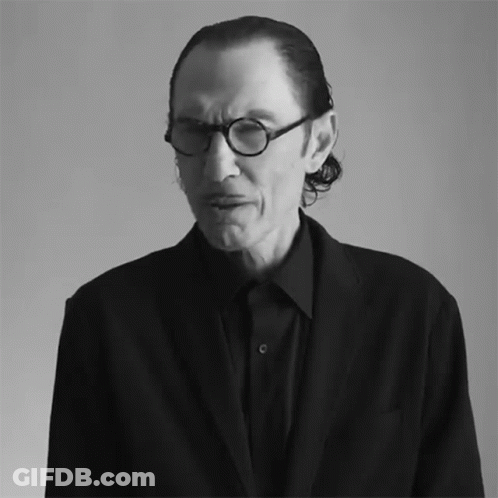 Black And White Man With Glasses And Black Shirt GIF