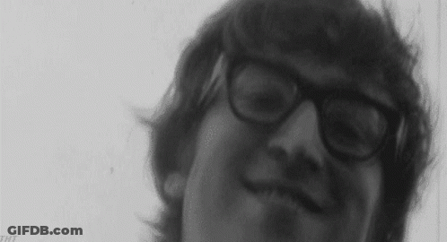 Black And White Man With Glasses Letters THT GIF