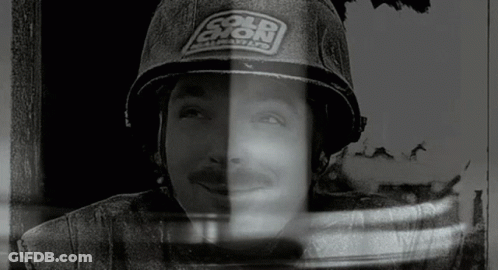 Black And White Man With Helmet Saying Cold Exion GIF