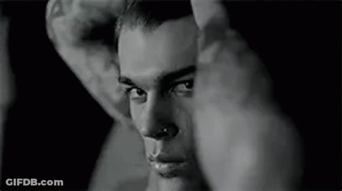 Black And White Man With Nose Ring And Face Tattoo GIF