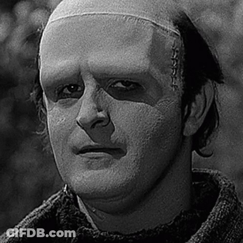 Black And White Man With Scar On Forehead GIF