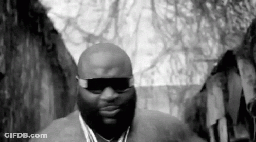 Black And White Man With Sunglasses And Medallion GIF