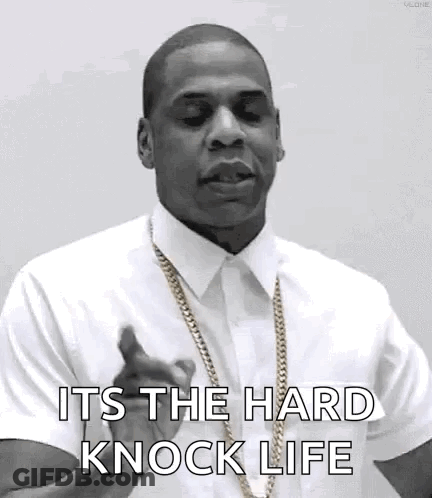 Black And White Man With White Shirt And Gold Chains GIF