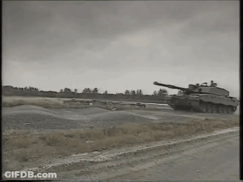 Black And White Military Tank Driving GIF