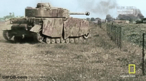 Black And White Military Tank In Field GIF