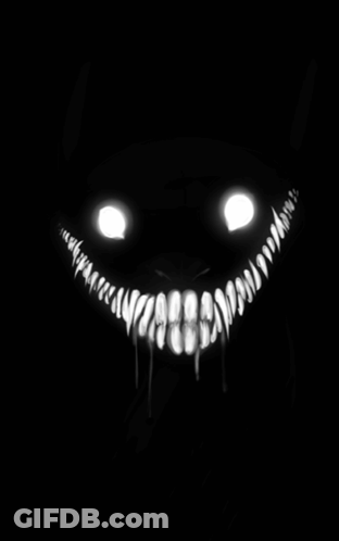 Black And White Monster Face With Glowing Mouth GIF