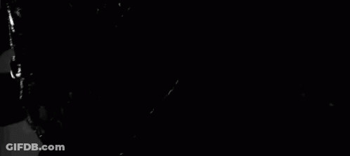 Black And White Monster With Sharp Teeth And Large Mouth GIF