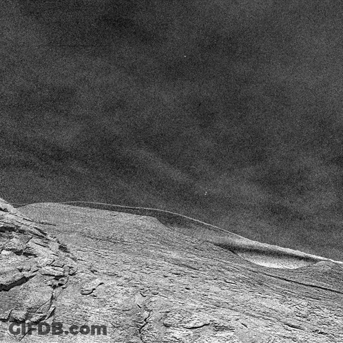 Black And White Mountain With Cloudy Sky GIF