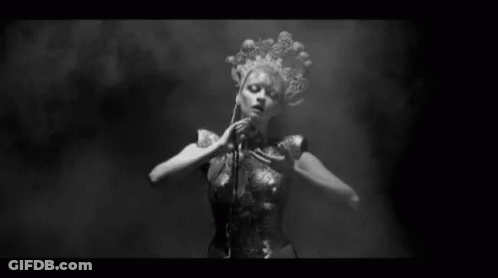 Black And White Naked Woman Dancing In Dark Room GIF