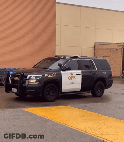 Black And White O.P.P. Police Vehicle GIF