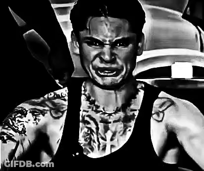 Black And White Painting Of Man With Tattooed Arms GIF