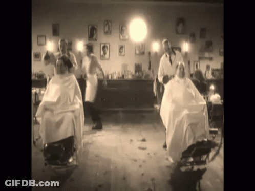 Black And White People Getting Haircuts GIF