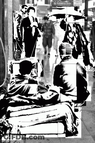 Black And White People On Sidewalk With Galicia Sign GIF