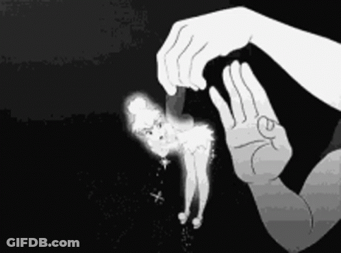 Black And White Person Holding Tinkerbell Doll GIF
