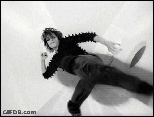 Black And White Person Laying On Ground GIF