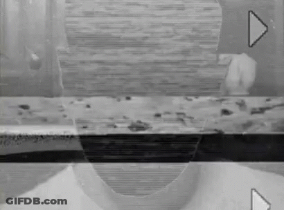 Black And White Person's Face On Screen GIF
