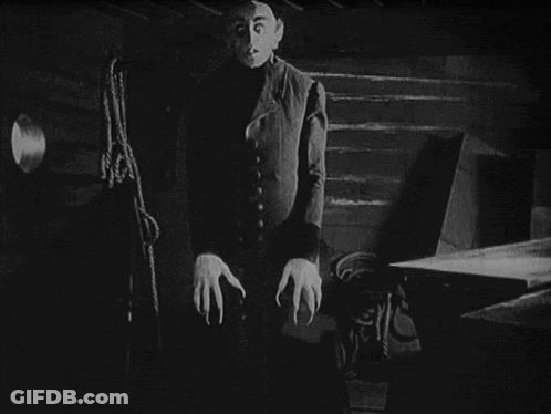 Black And White Person With Blue Circle GIF